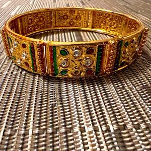 Large gold bangle bracelet